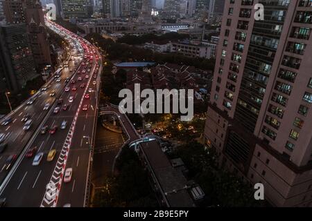 Shanghai, China - Oct 29, 2018: Aerial view of business area and cityscape in the dusk, West Nanjing Road, Jing` an district, Shanghai Stock Photo
